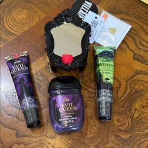Disney Villains (2) Lip Gloss, Sanitizer & Holder